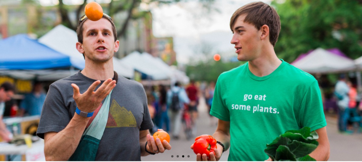 Three thoughts for food 1 Two people holding fruits and vegetables talking