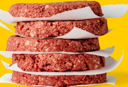 Stack of uncooked impossible burgers