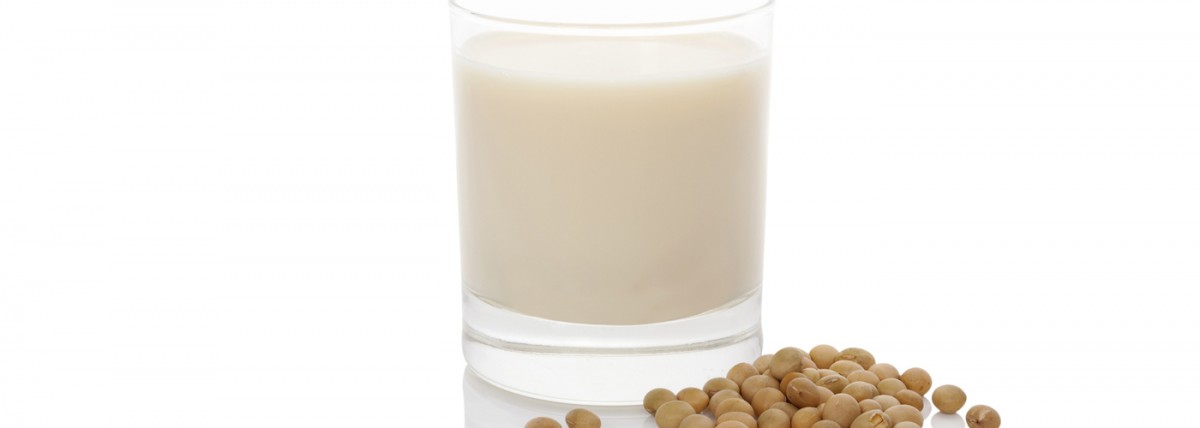Consumers not confused about ingredients used to make plant-based milks 1 Glass of milk next to soybeans