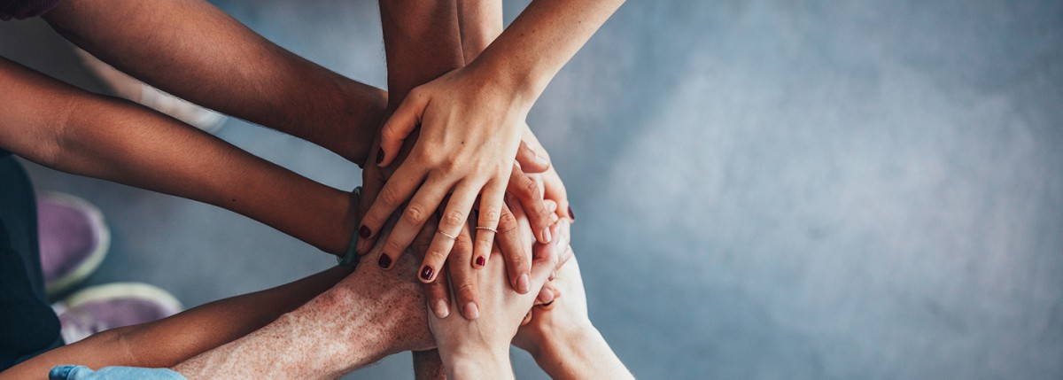 3 ways to support gfi this december 1 Hands in a stack