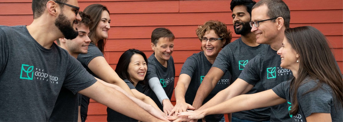 Top 10 good food moments of 2018 1 Gfi employee hands in a stack