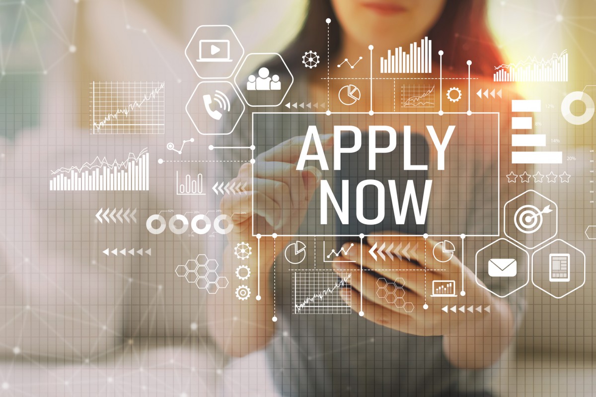 Apply now banner with person in background on phone