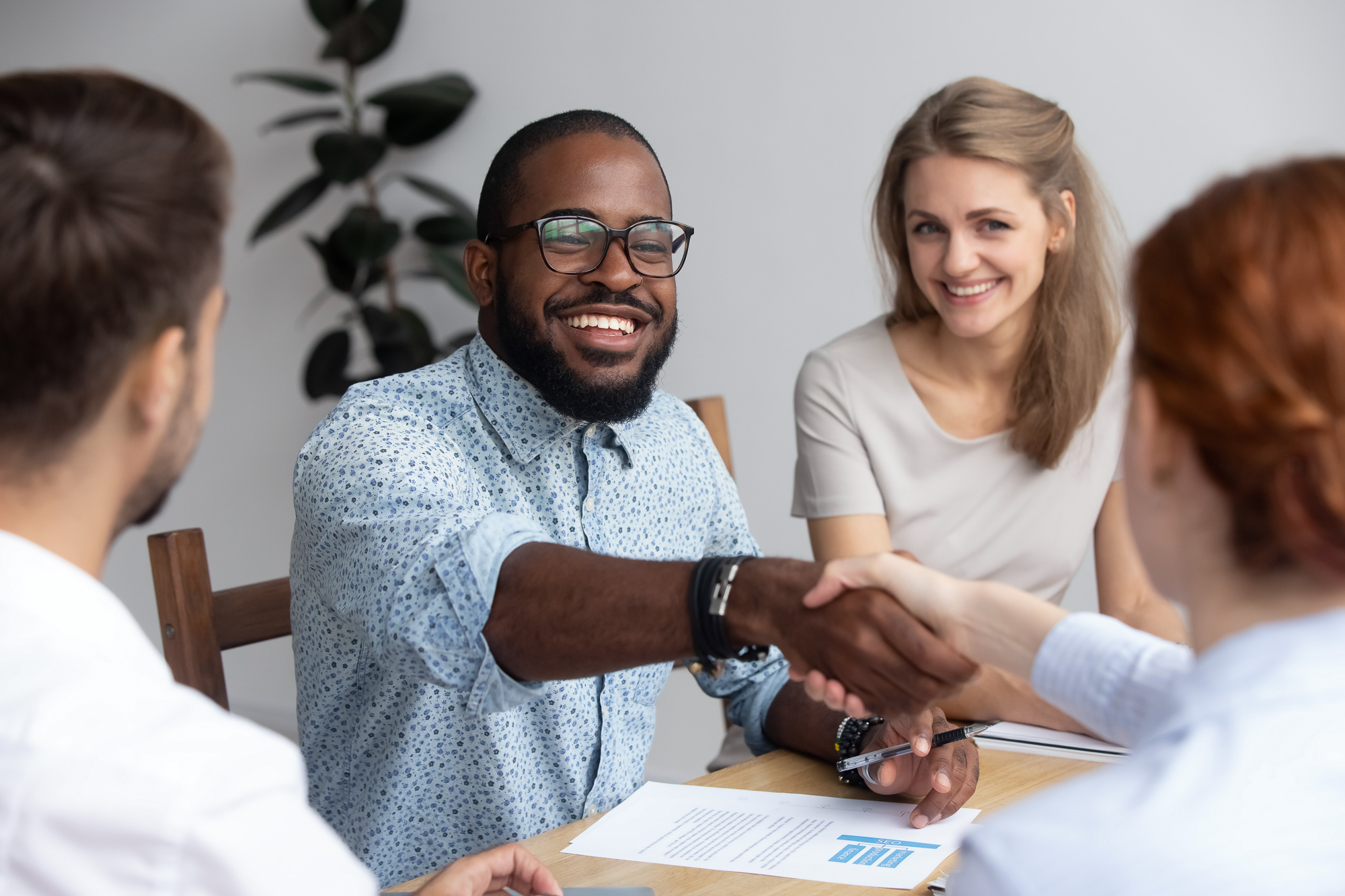 Investment 1 People shaking hands during a business meeting