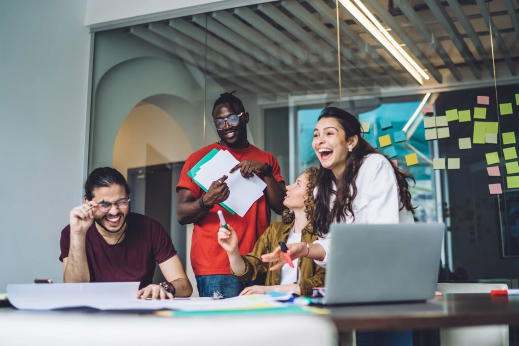 The alt protein student resource hub 7 Group of students in a work room laughing