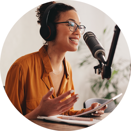 Image of student hosting a podcast