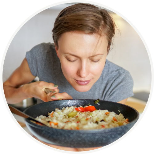 Woman smelling food