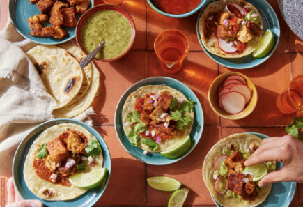 An overhead view of plates of plant-based tacos. Photo credit: Tender Foods.