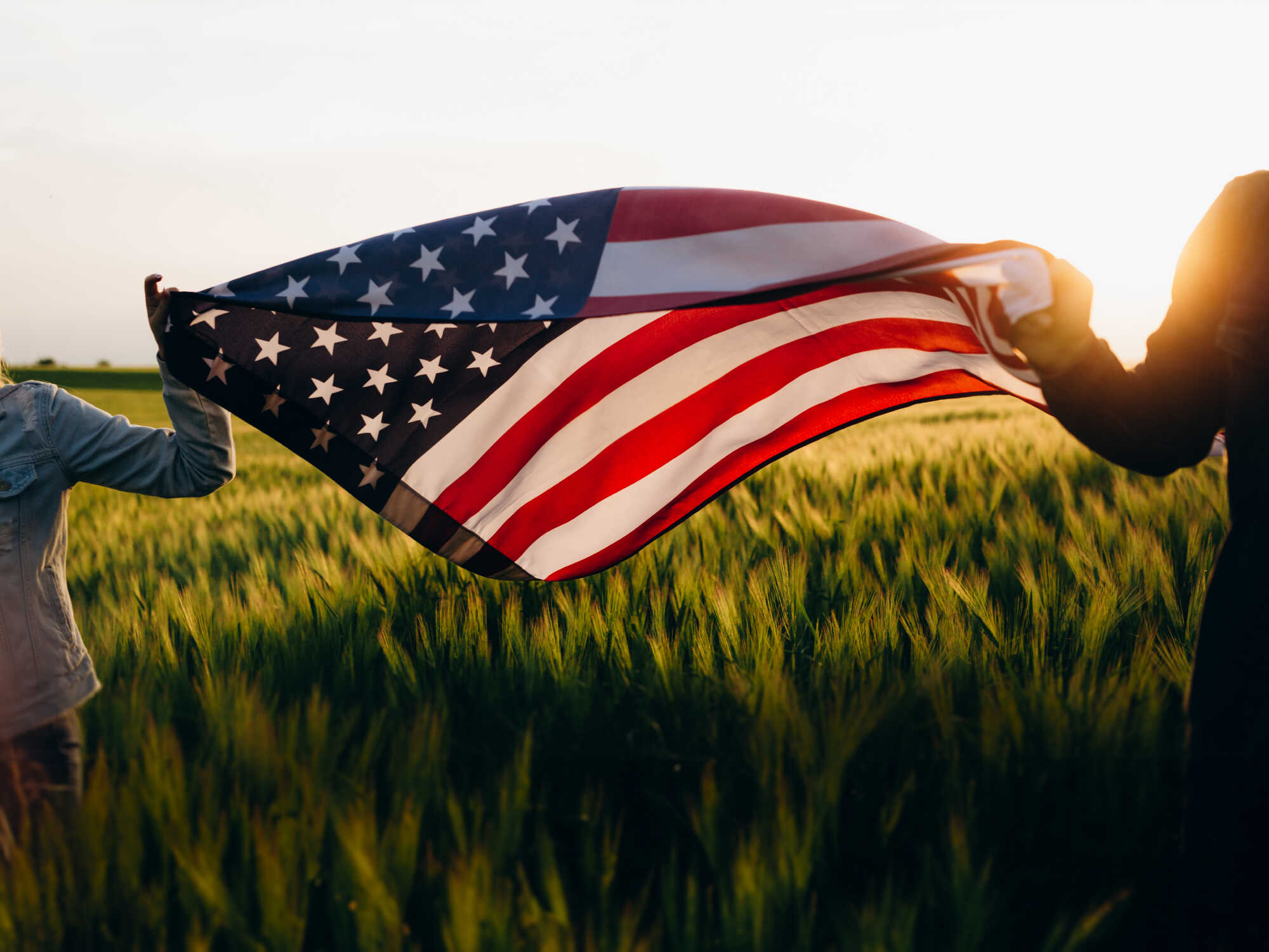 An american flag over a field