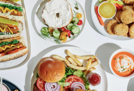 Plates of various prepared alternative protein dishes